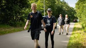 Runners walking part of a long route together